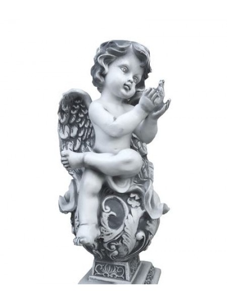 Фигурка Ангел сидя на фигурном шаре с голубкой (6.20).